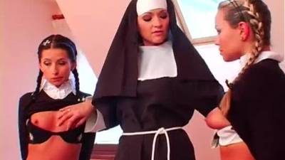 Naughty schoolgirl sluts gets whipped by a bad nun